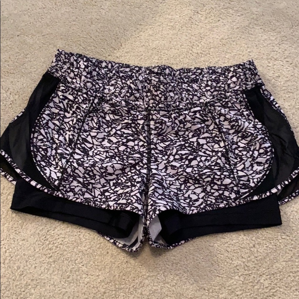 Lululemon 2.5” shorts w/ black spandex shorts